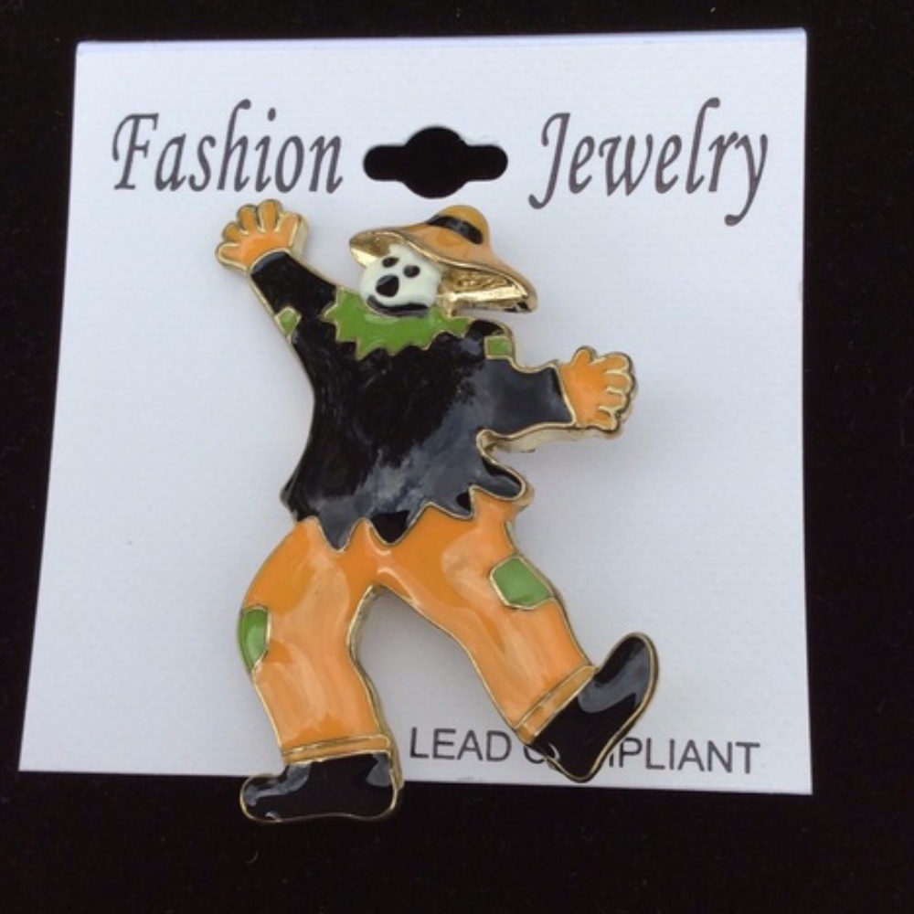 Gold tone orange, black, green Ghost scare…